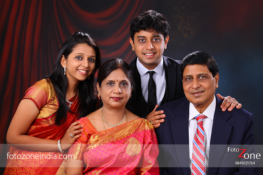 South Indian Family sitting Stock Photo - Alamy