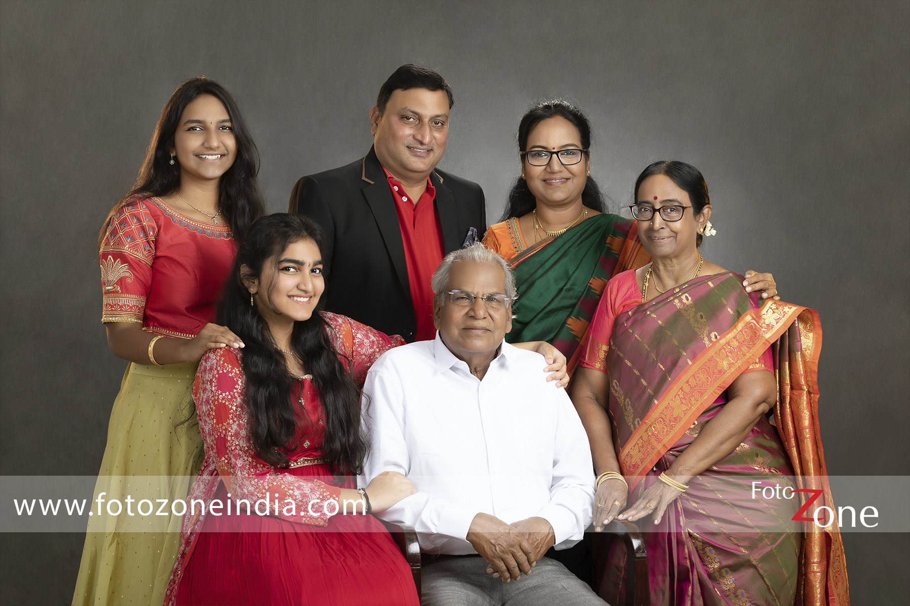 an indian family poses for a photo together generative ai 34758380 Stock  Photo at Vecteezy