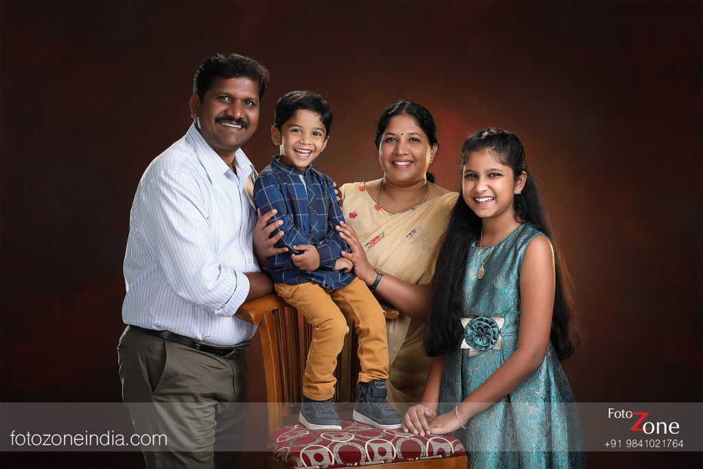 Premium Photo | Family portrait of parents and child in denim casual style  clothes. fashion models having fun on gray background.