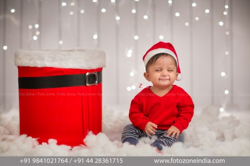 Red baby with cute smile